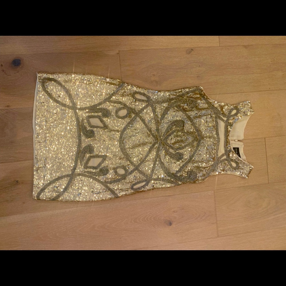 NWT Gold sequin dress with beautiful beading.